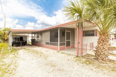 Nestled along the serene shores of Lake Smart, this charming on  in Florida - for sale on GolfHomes.com, golf home, golf lot