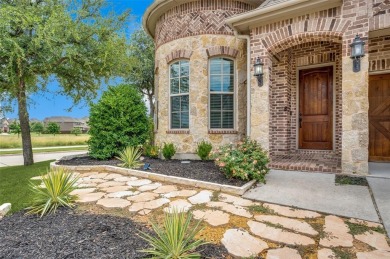 Stunning Corner Lot Home with Unmatched Pond Views in Premier on The Tribute At the Colony in Texas - for sale on GolfHomes.com, golf home, golf lot