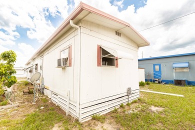 Nestled along the serene shores of Lake Smart, this charming on  in Florida - for sale on GolfHomes.com, golf home, golf lot