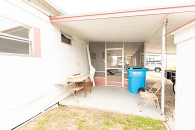 Nestled along the serene shores of Lake Smart, this charming on  in Florida - for sale on GolfHomes.com, golf home, golf lot