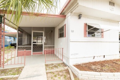 Nestled along the serene shores of Lake Smart, this charming on  in Florida - for sale on GolfHomes.com, golf home, golf lot