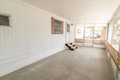 Nestled along the serene shores of Lake Smart, this charming on  in Florida - for sale on GolfHomes.com, golf home, golf lot