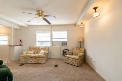 Nestled along the serene shores of Lake Smart, this charming on  in Florida - for sale on GolfHomes.com, golf home, golf lot
