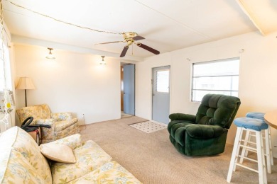 Nestled along the serene shores of Lake Smart, this charming on  in Florida - for sale on GolfHomes.com, golf home, golf lot