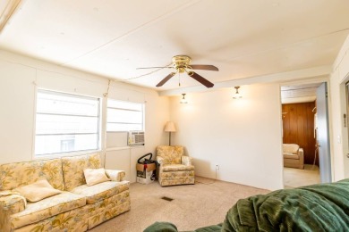 Nestled along the serene shores of Lake Smart, this charming on  in Florida - for sale on GolfHomes.com, golf home, golf lot