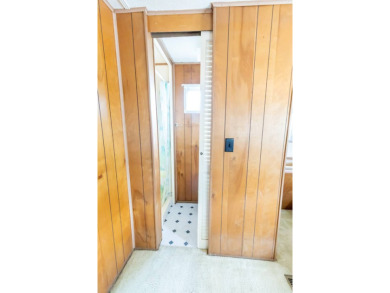 Nestled along the serene shores of Lake Smart, this charming on  in Florida - for sale on GolfHomes.com, golf home, golf lot