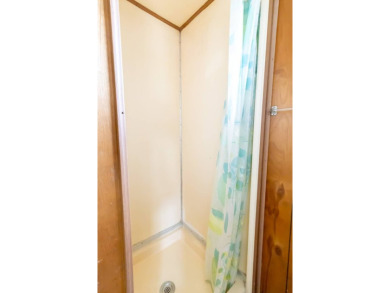 Nestled along the serene shores of Lake Smart, this charming on  in Florida - for sale on GolfHomes.com, golf home, golf lot
