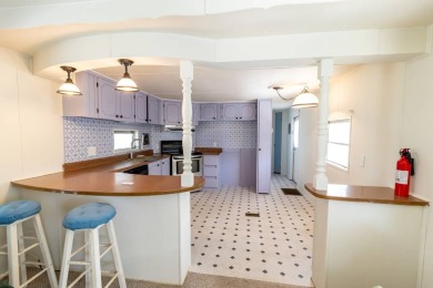Nestled along the serene shores of Lake Smart, this charming on  in Florida - for sale on GolfHomes.com, golf home, golf lot
