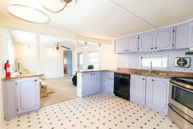 Nestled along the serene shores of Lake Smart, this charming on  in Florida - for sale on GolfHomes.com, golf home, golf lot