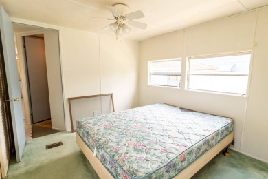 Nestled along the serene shores of Lake Smart, this charming on  in Florida - for sale on GolfHomes.com, golf home, golf lot