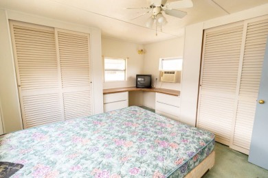 Nestled along the serene shores of Lake Smart, this charming on  in Florida - for sale on GolfHomes.com, golf home, golf lot