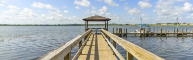 Nestled along the serene shores of Lake Smart, this charming on  in Florida - for sale on GolfHomes.com, golf home, golf lot