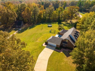 Situated on a stunning 3.5-acre corner lot directly across from on Somerville Country Club in Tennessee - for sale on GolfHomes.com, golf home, golf lot