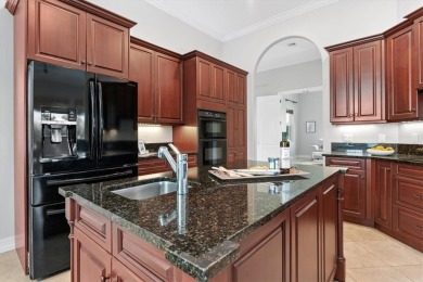 Luxury awaits in this 2,722 sqft concrete-block home! Featuring on Oak Harbor Country Club in Florida - for sale on GolfHomes.com, golf home, golf lot