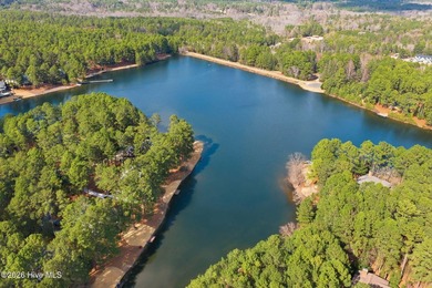 Beautiful 0.86-acre homesite in the gated community of Pinewild on Pinewild Country Club of Pinehurst in North Carolina - for sale on GolfHomes.com, golf home, golf lot