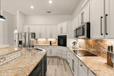 This elegant and inviting 5BR/4BA home is surrounded by lush on Plantation at Ponte Vedra in Florida - for sale on GolfHomes.com, golf home, golf lot