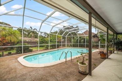 Welcome to this large ranch style, 4-bedroom, 2.5-bathroom home on Feather Sound Country Club in Florida - for sale on GolfHomes.com, golf home, golf lot