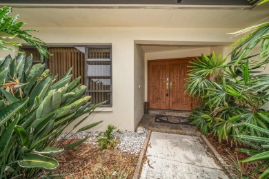 Welcome to this large ranch style, 4-bedroom, 2.5-bathroom home on Feather Sound Country Club in Florida - for sale on GolfHomes.com, golf home, golf lot
