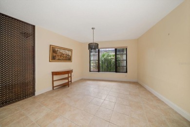 Welcome to this large ranch style, 4-bedroom, 2.5-bathroom home on Feather Sound Country Club in Florida - for sale on GolfHomes.com, golf home, golf lot