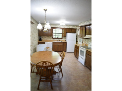 Quaint and quite home on a beautiful street in Fairfield Bay! on Mountain Ranch Golf Club in Arkansas - for sale on GolfHomes.com, golf home, golf lot