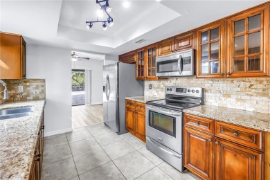 One or more photo(s) has been virtually staged. This charming on Northdale Golf and Tennis Club in Florida - for sale on GolfHomes.com, golf home, golf lot