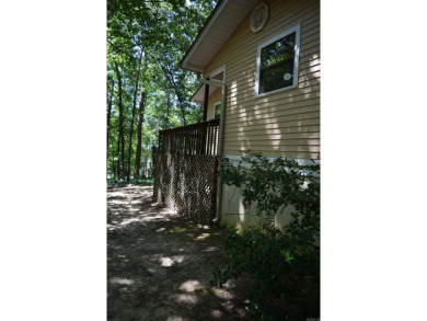 Quaint and quite home on a beautiful street in Fairfield Bay! on Mountain Ranch Golf Club in Arkansas - for sale on GolfHomes.com, golf home, golf lot
