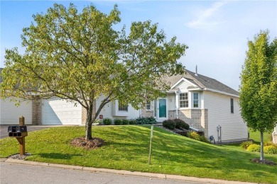 Enjoy a carefree lifestyle in this beautiful end-unit townhome on Crystal Lake Golf Course in Minnesota - for sale on GolfHomes.com, golf home, golf lot