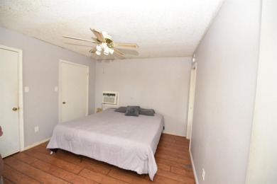 Nestled on a quiet street in the Bay, this charming home sits on on Indian Hills Country Club in Arkansas - for sale on GolfHomes.com, golf home, golf lot