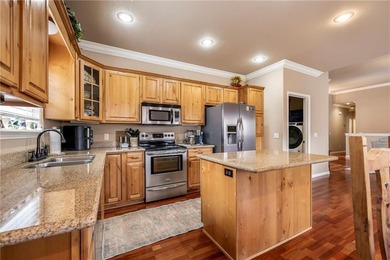 Enjoy easy living in this well-located home with walk-out on Bella Vista - Metfield Golf Complex and Country Club in Arkansas - for sale on GolfHomes.com, golf home, golf lot