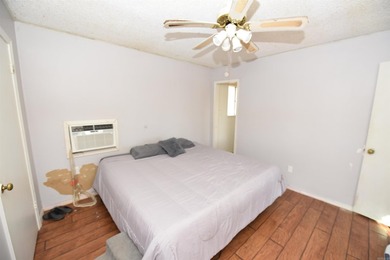 Nestled on a quiet street in the Bay, this charming home sits on on Indian Hills Country Club in Arkansas - for sale on GolfHomes.com, golf home, golf lot