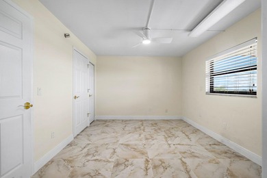 Come enjoy a golf course view from the top floor of your new on Boca Dunes Golf and Country Club in Florida - for sale on GolfHomes.com, golf home, golf lot