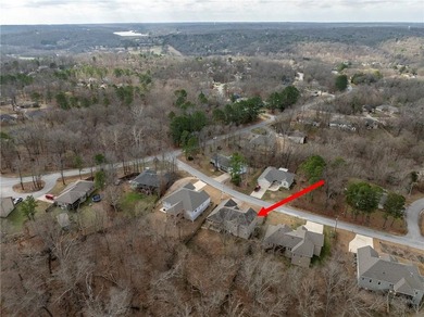 Enjoy easy living in this well-located home with walk-out on Bella Vista - Metfield Golf Complex and Country Club in Arkansas - for sale on GolfHomes.com, golf home, golf lot