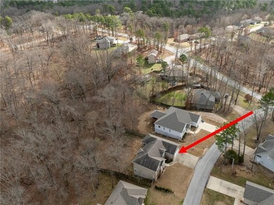 Enjoy easy living in this well-located home with walk-out on Bella Vista - Metfield Golf Complex and Country Club in Arkansas - for sale on GolfHomes.com, golf home, golf lot