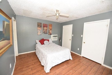 Nestled on a quiet street in the Bay, this charming home sits on on Indian Hills Country Club in Arkansas - for sale on GolfHomes.com, golf home, golf lot