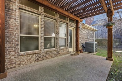 Located in a private, gated golf course community, this charming on WaterChase Golf Club in Texas - for sale on GolfHomes.com, golf home, golf lot