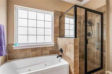 Enjoy easy living in this well-located home with walk-out on Bella Vista - Metfield Golf Complex and Country Club in Arkansas - for sale on GolfHomes.com, golf home, golf lot