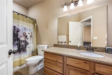 Enjoy easy living in this well-located home with walk-out on Bella Vista - Metfield Golf Complex and Country Club in Arkansas - for sale on GolfHomes.com, golf home, golf lot