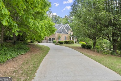 This stunning traditional home, nestled on the picturesque on Pinetree Country Club in Georgia - for sale on GolfHomes.com, golf home, golf lot