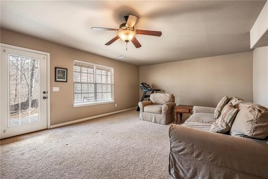 Enjoy easy living in this well-located home with walk-out on Bella Vista - Metfield Golf Complex and Country Club in Arkansas - for sale on GolfHomes.com, golf home, golf lot