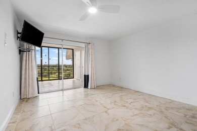 Come enjoy a golf course view from the top floor of your new on Boca Dunes Golf and Country Club in Florida - for sale on GolfHomes.com, golf home, golf lot