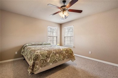 Enjoy easy living in this well-located home with walk-out on Bella Vista - Metfield Golf Complex and Country Club in Arkansas - for sale on GolfHomes.com, golf home, golf lot