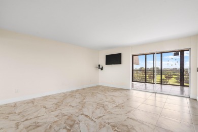 Come enjoy a golf course view from the top floor of your new on Boca Dunes Golf and Country Club in Florida - for sale on GolfHomes.com, golf home, golf lot