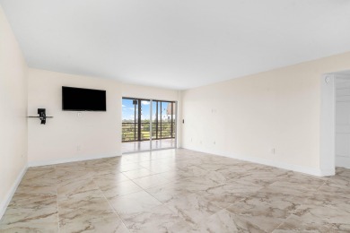 Come enjoy a golf course view from the top floor of your new on Boca Dunes Golf and Country Club in Florida - for sale on GolfHomes.com, golf home, golf lot