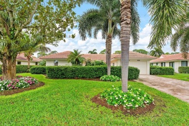 Nestled within lush landscaping and peaceful water views, this on Quail Ridge Golf Course and Country Club in Florida - for sale on GolfHomes.com, golf home, golf lot