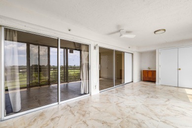 Come enjoy a golf course view from the top floor of your new on Boca Dunes Golf and Country Club in Florida - for sale on GolfHomes.com, golf home, golf lot