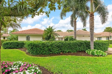 Nestled within lush landscaping and peaceful water views, this on Quail Ridge Golf Course and Country Club in Florida - for sale on GolfHomes.com, golf home, golf lot