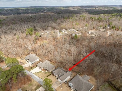 Enjoy easy living in this well-located home with walk-out on Bella Vista - Metfield Golf Complex and Country Club in Arkansas - for sale on GolfHomes.com, golf home, golf lot