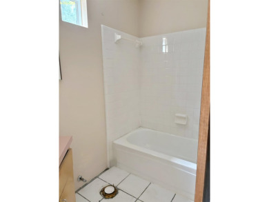 End unit Townhouse with partial lake and Hilaman Golf Course on Hilaman Park Golf Course in Florida - for sale on GolfHomes.com, golf home, golf lot