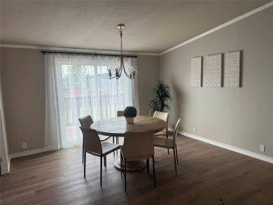 This is a newly remodeled mobile home in Horseshoe Bend Air Park on Horseshoe Bend Country Club in Texas - for sale on GolfHomes.com, golf home, golf lot