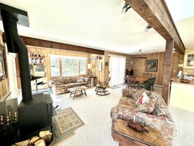 This four bedroom, three bathroom townhome is located just off on Hermitage Club Golf Course in Vermont - for sale on GolfHomes.com, golf home, golf lot